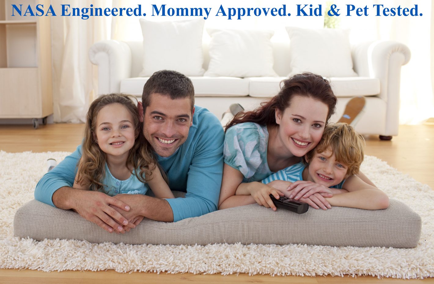 Smiling family on floor lying in living-room